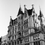 a black and white photo of a large building