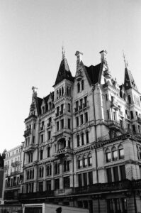 a black and white photo of a large building